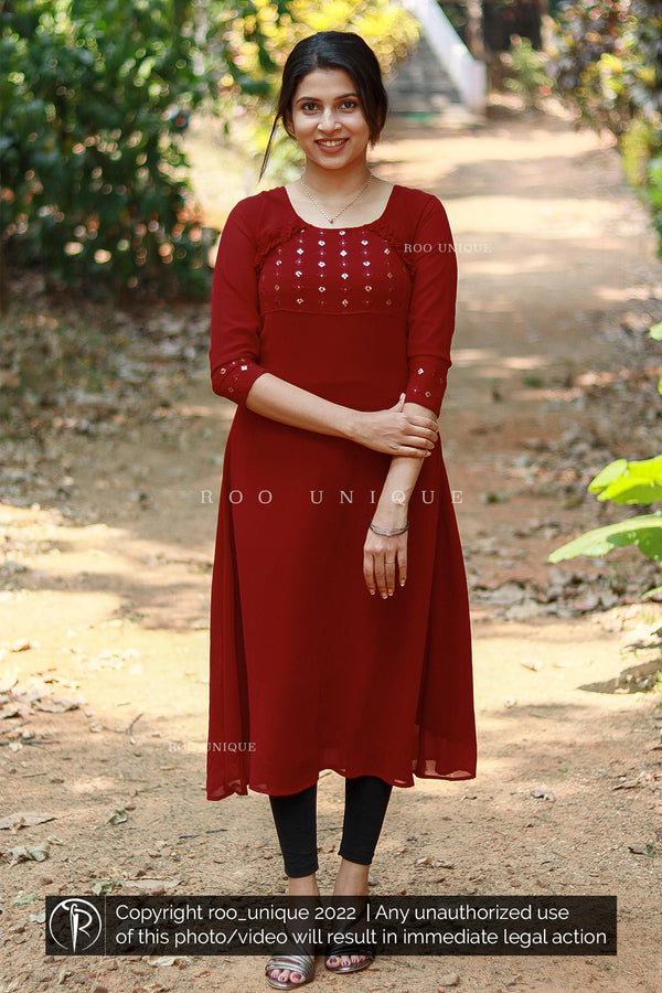 Maroon A-line Designer Kurti With Embroidery Detailing.