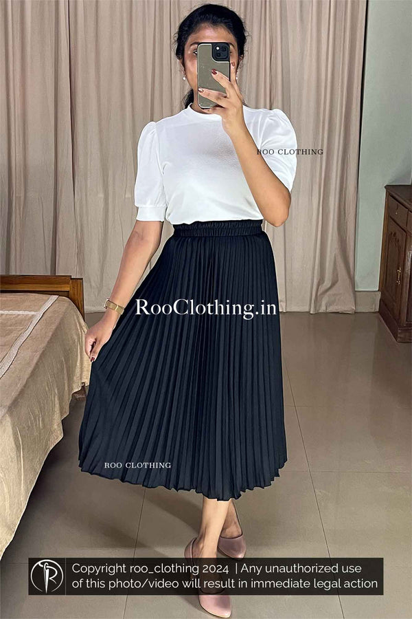 Black Accordion Pleated Skirt paired with White Crew Neck Puff Sleeves Top