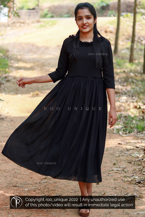 Black Dress With Frilled Neck And Waist Gathering