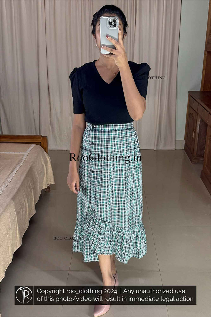 Green Tartan Checked A-Line Cotton Skirt with Layered Frill Hem paired with Black Shade V Neck Top With Puff Sleeves Roo Clothing India Kerala