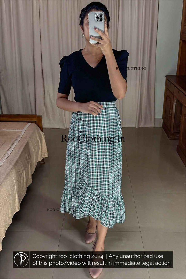 Green Tartan Checked A-Line Cotton Skirt with Layered Frill Hem paired with Black Shade V Neck Top With Puff Sleeves Roo Clothing India Kerala