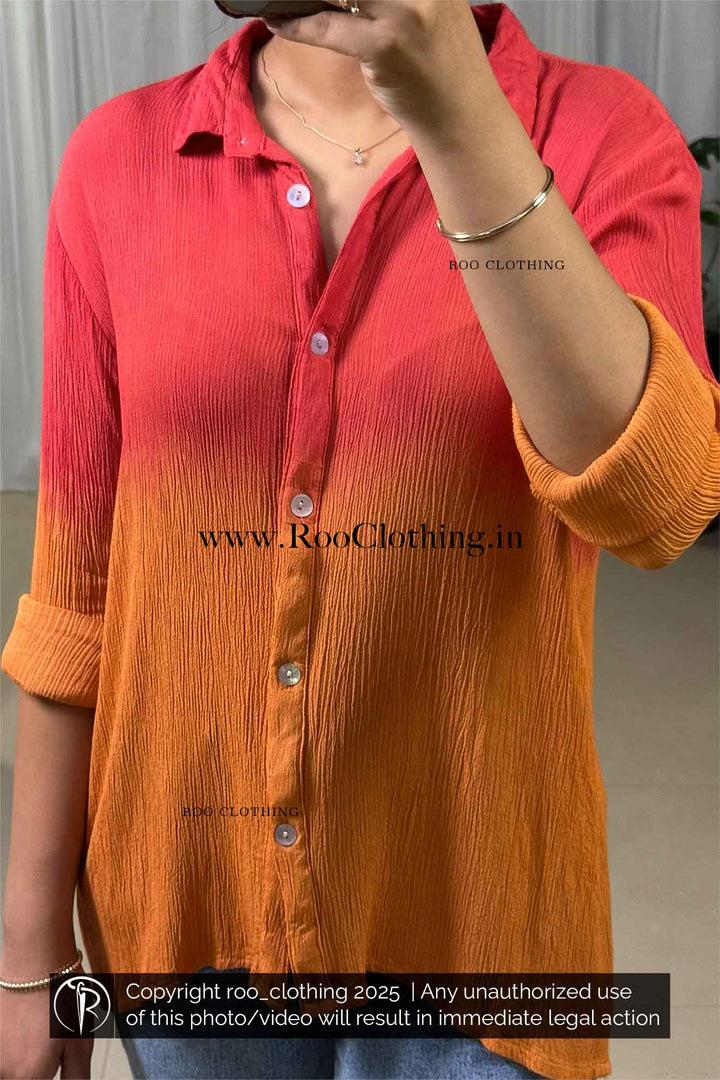 Person wearing a red to orange gradient shirt with 'Roo Clothing' branding.